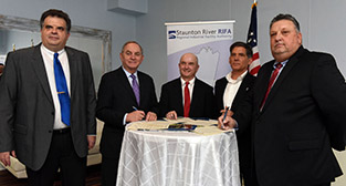 Mayor at signing ceremony